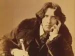 Oscar_Wilde_portrait_by_Napoleon_Sarony_-_albumen cropped 4/3